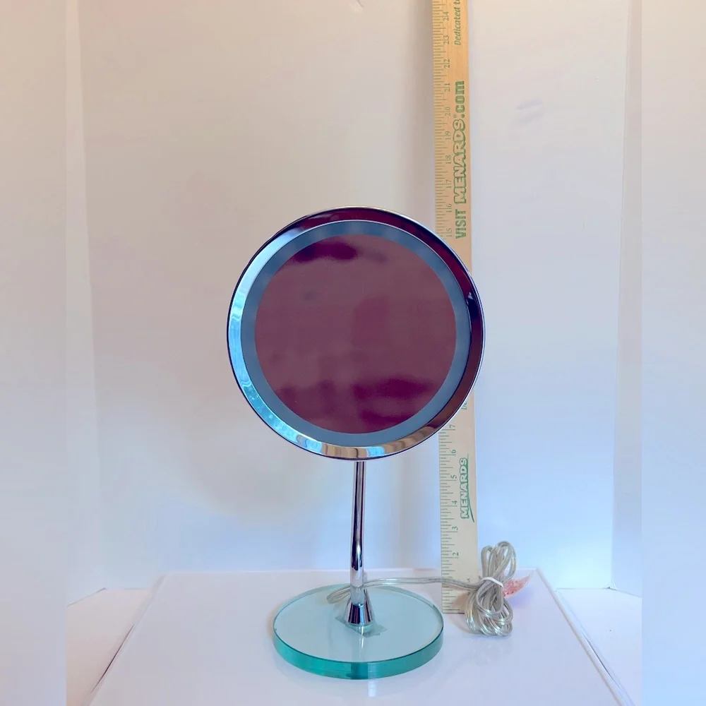 Silver Lighted Magnifying Stand Makeup Mirror on a Clear Lucite Base by HoMedics